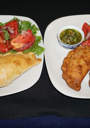 A picture of Shrimp, Cheese, and Cilantro Sauce Empanadas.