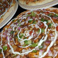 A picture of Karahi pizza😋.
