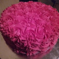 A picture of Rosy pink butter cream cake.