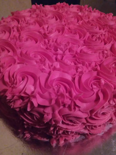 A picture of Rosy pink butter cream cake.