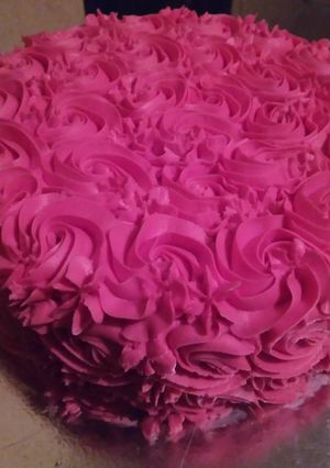 A picture of Rosy pink butter cream cake.