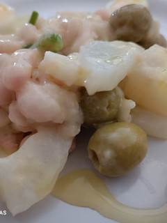 Una foto de Empedrado de judías con bacalao en crema de naranja