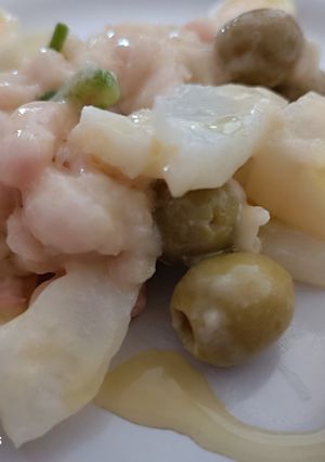 Foto principal de Empedrado de judías con bacalao en crema de naranja