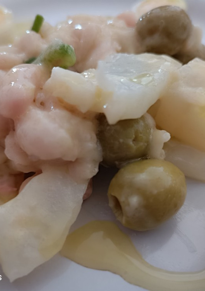Una foto de Empedrado de judías con bacalao en crema de naranja