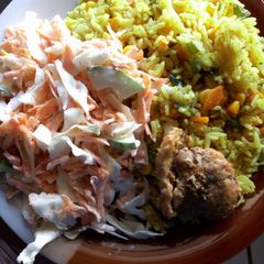 Fried rice and salad A picture of Fried rice and salad.