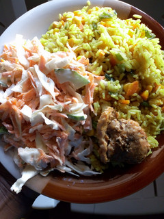 A picture of Fried rice and salad.