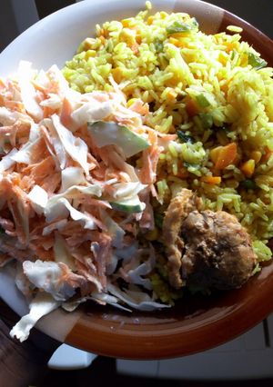 A picture of Fried rice and salad.