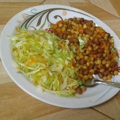 A picture of Githeri with Steamed Coselaw Salad.