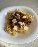 Tallarines con champiñones y tomate seco
