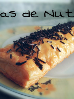 Una foto de Cañas de hojaldre rellenas de Nutella