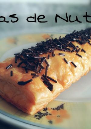 Una foto de Cañas de hojaldre rellenas de Nutella