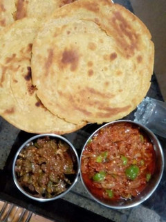 A picture of Timatar ki chutney with Besan ki roti...😍😋.