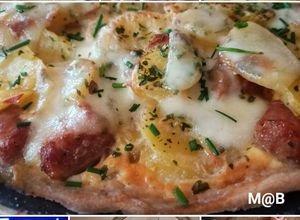 Une photo de Tarte aux chipolatas et pommes de terre au Cook Expert