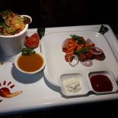 A picture of Peri Peri Paneer Biryani curry.
