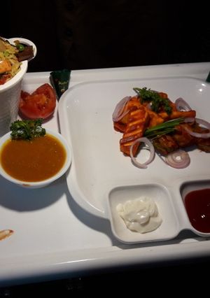 A picture of Peri Peri Paneer Biryani curry.