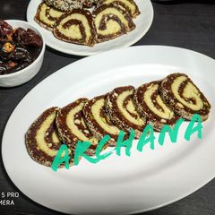Dates mawa Swiss roll burfi A picture of Dates mawa Swiss roll burfi.