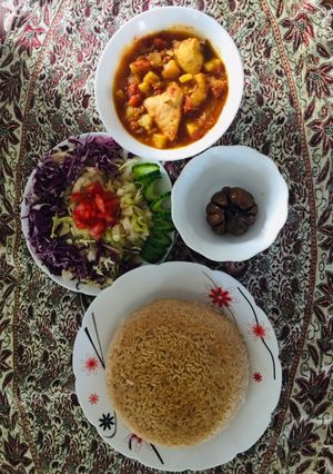 عکسی از دستور خورشت محلی گوجه با کته