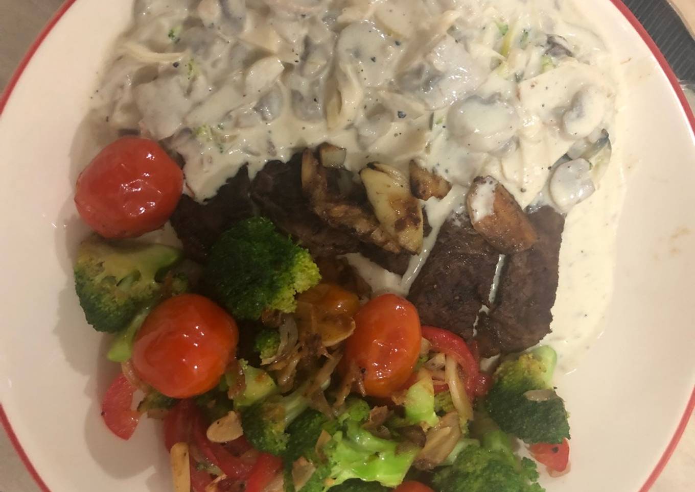 Rib Eye steak with truffle mushroom sauce and sauté vegetable