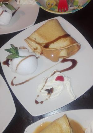 Una foto de Postre de panqueques con helado emplatado gourmet