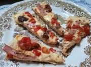Una foto de tomate cherry pizza