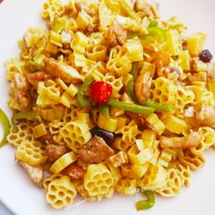 Chicken Chilli Dry with flower macroni A picture of Chicken Chilli Dry with flower macroni.