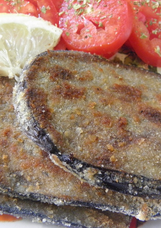 Una foto de Milanesas de berenjenas al horno