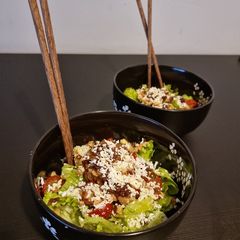 A picture of Green cheesy salad.