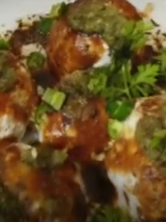 A picture of Bread dahi vada.