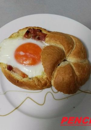 Foto principal de Huevos en nido de pan gratinado