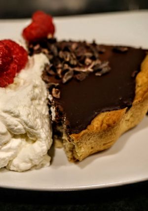 A picture of Chocolate tart. A slice is like eating a really big truffle :).