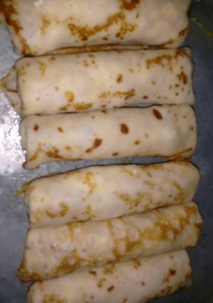 Una foto de Canelones de ricota, jamón y quesos