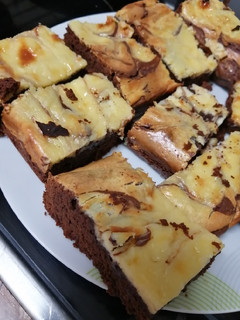 Una foto de Brownie con cheesecake