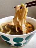 Kalguksu in brodo di pesce e verdure, sfumati alla birra