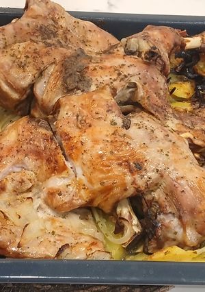 Una foto de Medio Cordero Lechal con Patatas al Horno
