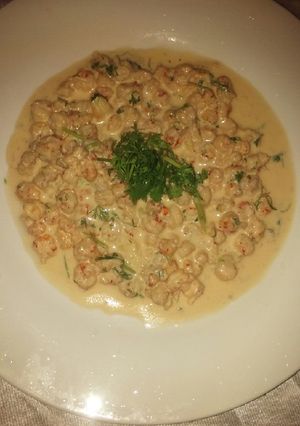 Una foto de Camarones en crema