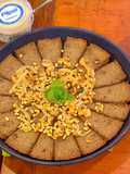 Kibbee Busta (Baked Kibbee with onion and pine nuts)