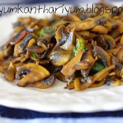 A picture of Easy Mushroom mezhukkupuratti /stir fry.