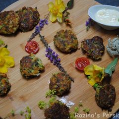 A picture of Zucchini frittat with orange-yogurt sauce.