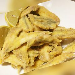 A picture of Alici impanate - fried breaded anchovies.