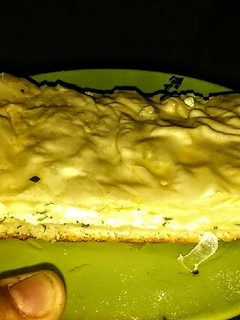 Una foto de Torta de quesos y cebolla