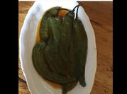 Une photo de olive piment