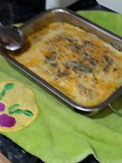Una foto de Lasaña de pasta de croquetas de tortilla de calçots y jamón