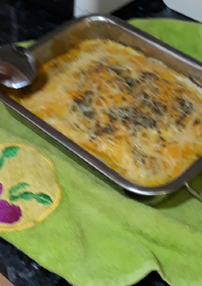 Una foto de Lasaña de pasta de croquetas de tortilla de calçots y jamón