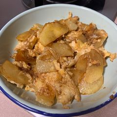 A picture of Fried egg with potato.