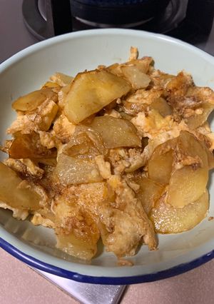 A picture of Fried egg with potato.
