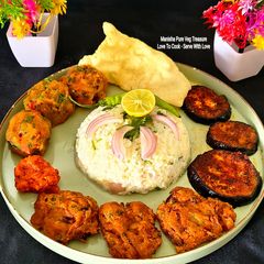 A picture of Panta Bhaat - Aloo Bhorta - Piyaji Pakora - Begun Bhaja - Summer Special Bengali Platter.
