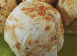Una foto de Pao de queijo o chipa