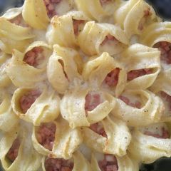 A picture of Lumaconi al forno con mortadella.