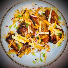 A picture of "Messy" Loaded Glazed Pork Ribs.