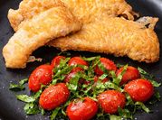 Una foto de escalope de pescado